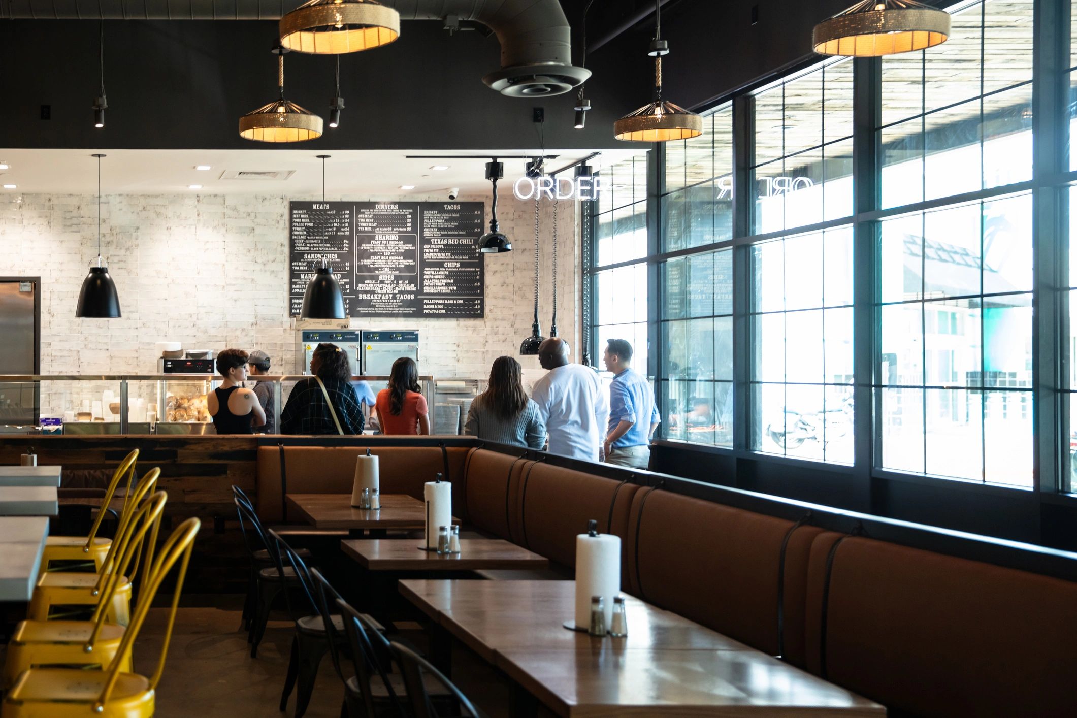 Guests gathering inside a vibrant restaurant